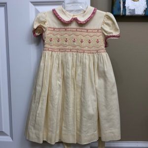 Girls light yellow smocked dress